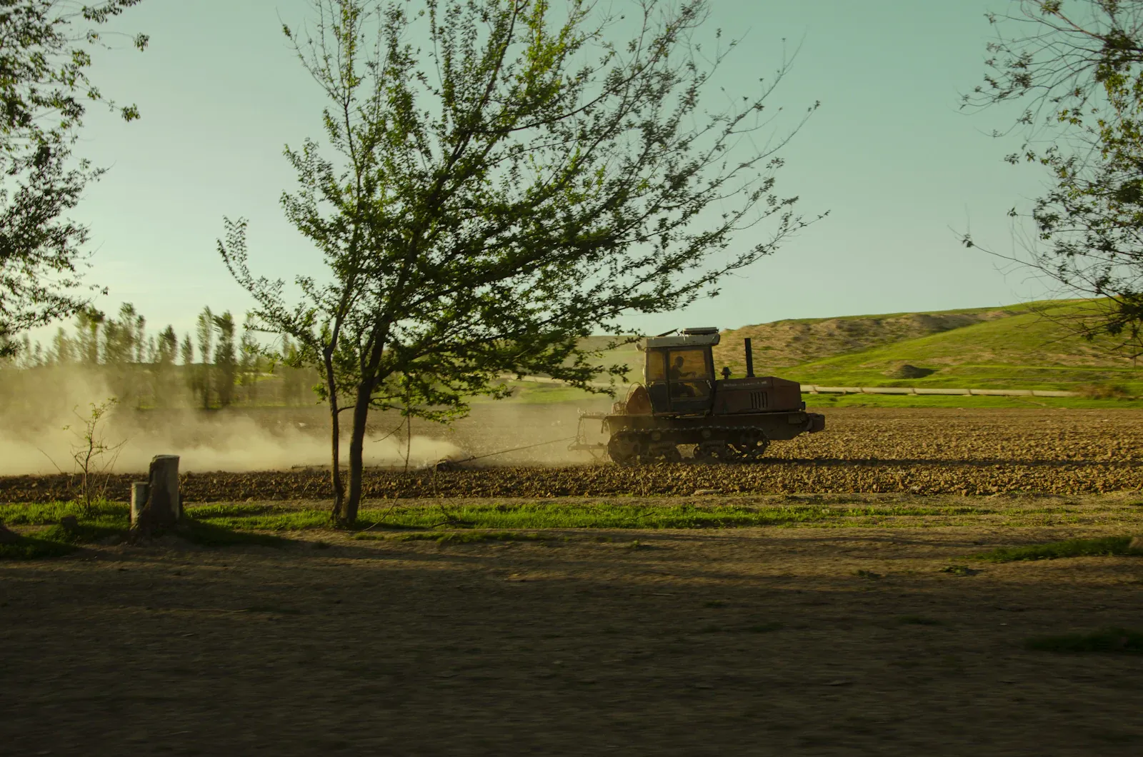 A tractor ploughing a field in Uzbekistan